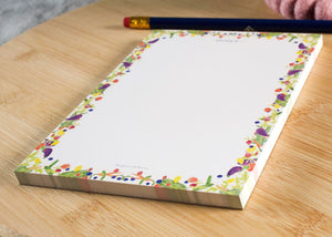 plain notepad illustrated with fruit and veggies