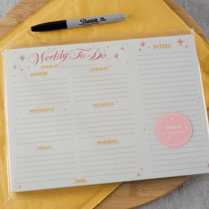 Weekly to do planner. Lined with pink heading and pink stars. Runs Monday to Friday with a section for the weekend.  Write your daily to-do's and weekly notes on one page. 